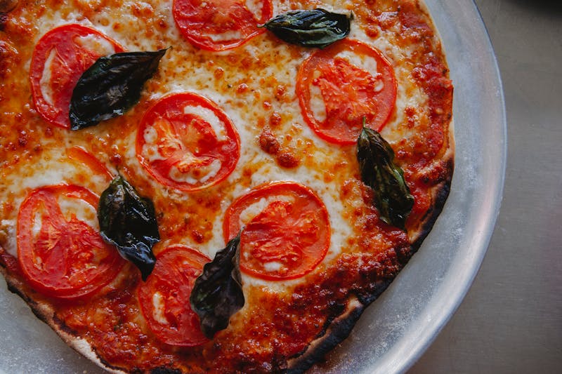 Seasons Signature Pizza with four seasonal toppings
